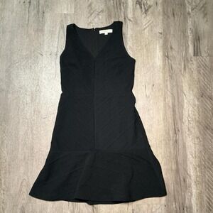 LOFT black dress with pleated skirt and V-neckline. Size: 2